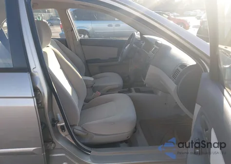 2006 Kia Spectra Lx/Ex z USA, uszkodzony, nr VIN KNAFE121665335912